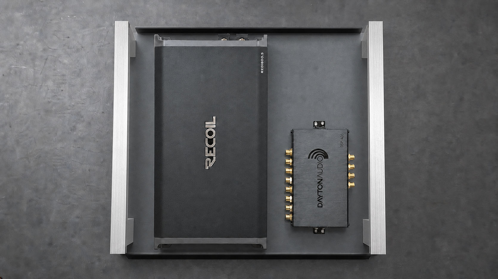 Top view of an AI-assisted visualization of a shallow amplifier and DSP drawer with raised aluminum side rails.